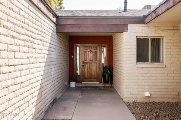a view of a entryway door front of house