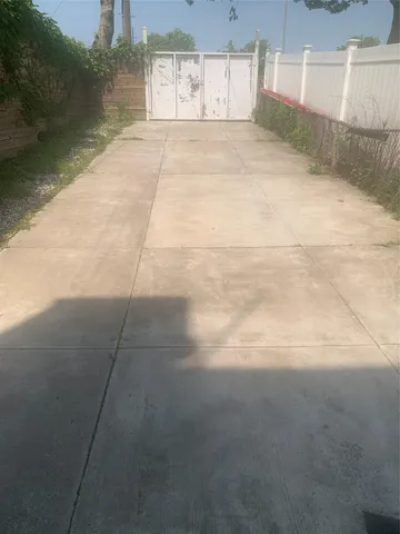 a view of a backyard of the house