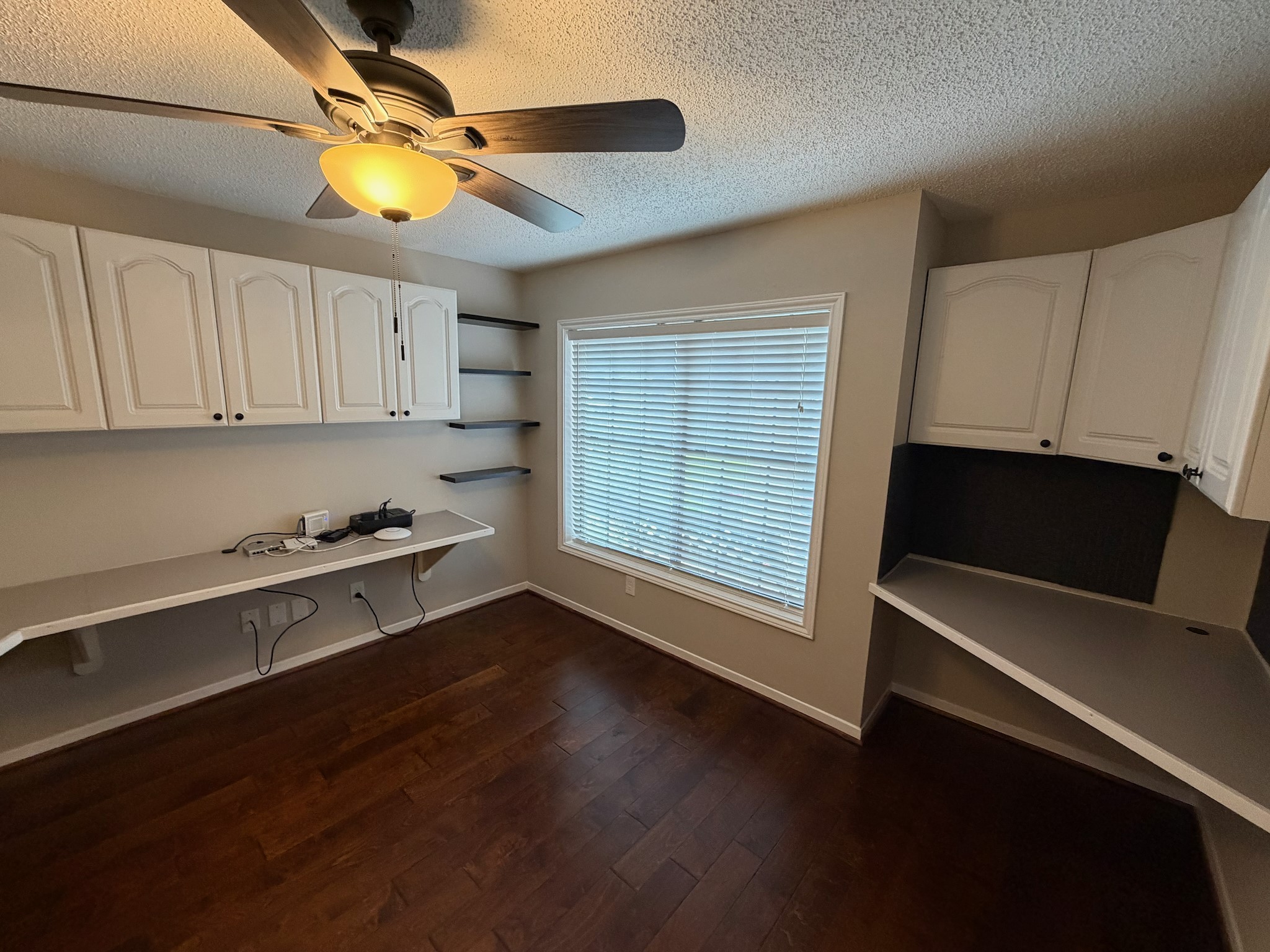 2326 Streamcrest Lane Sugar Land, TX 77479 - Photo 8 of 42 Study with built-in cabinets and counters.