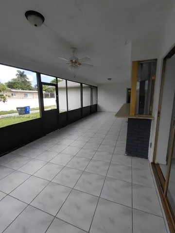 a view of a livingroom with a large window