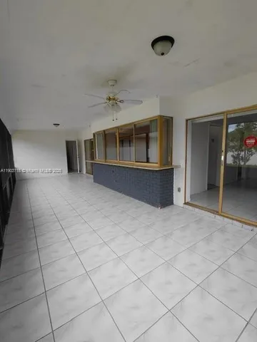 a view of a livingroom with a staircase