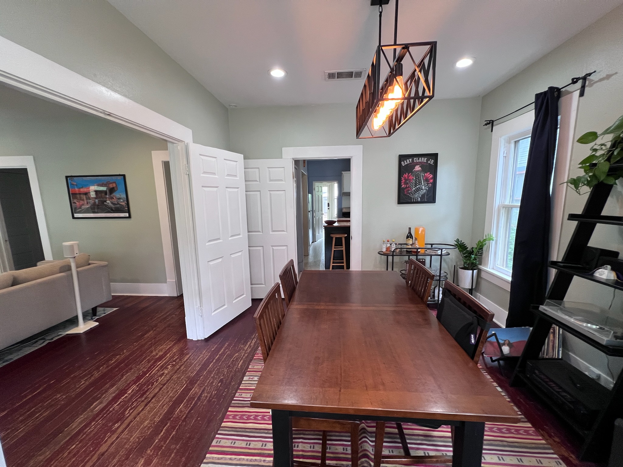 307 East 35th Street, Unit A Austin, TX 78705 - Photo 11 of 31 Rich hardwood floors complement this spacious dining room, perfect for entertaining.