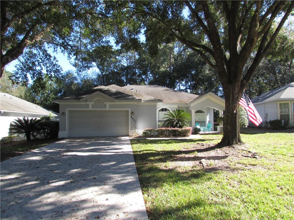 8801 Southwest 192nd Court Road Dunnellon, FL 34432 - Photo 1 of 1 FRONT OF VILLA WITH PORCH