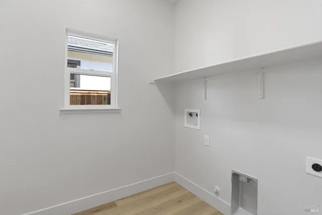 a view of a room that has a window in it