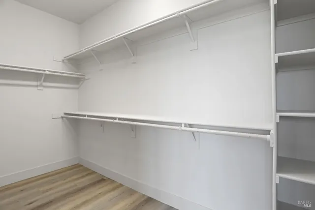 a view of an empty walk in closet