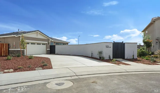 a front view of a house with yard