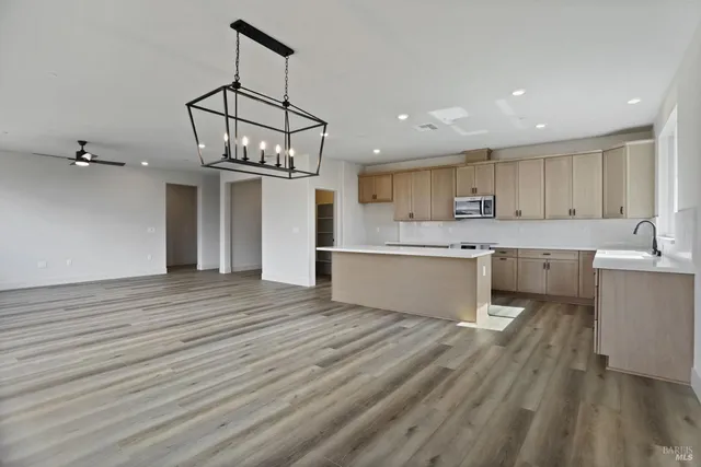 a view of a kitchen with cabinets