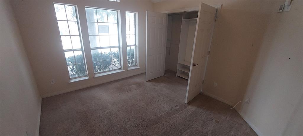 4102 Midrose Trail Dallas, TX 75287 - Photo 13 of 16 an empty room with windows