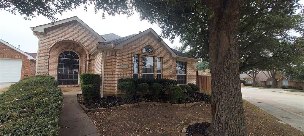 4102 Midrose Trail Dallas, TX 75287 - Photo 4 of 16 a front view of a house with garden