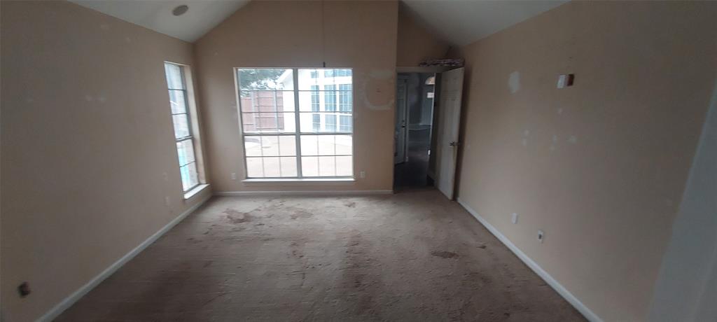 4102 Midrose Trail Dallas, TX 75287 - Photo 10 of 16 an empty room with windows and closet