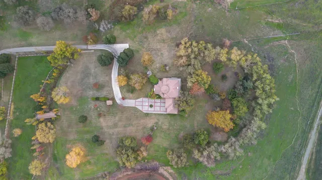 a view of kitchen with furniture and large window