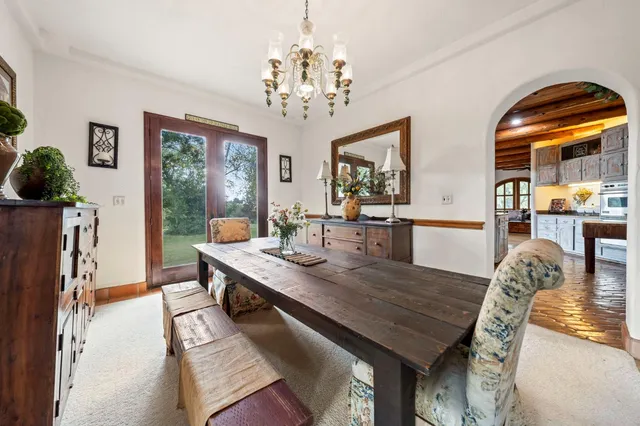 a bedroom with furniture a bed and a window