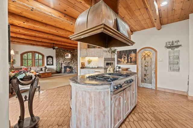 a view of a field with trees in the background