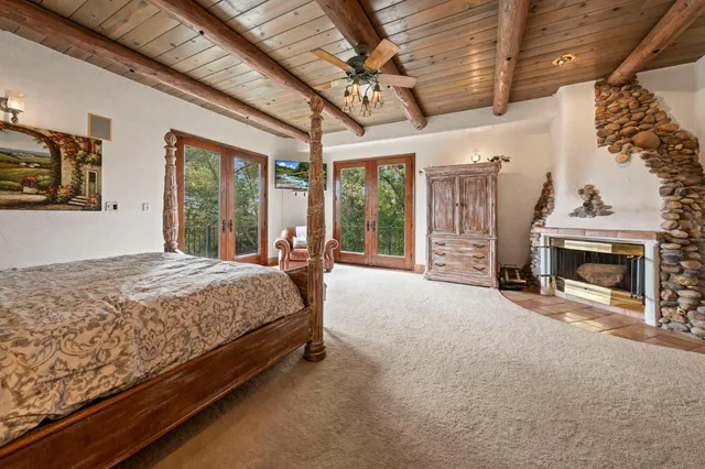 a house with swimming pool in front of it