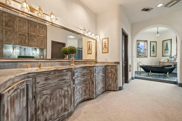 a view of a field with an trees