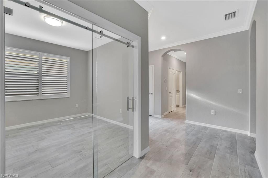 1603 Santiago Circle Naples, FL 34113 - Photo 15 of 46 a view of an empty room