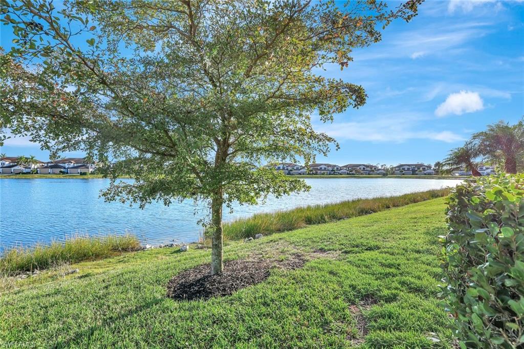 1603 Santiago Circle Naples, FL 34113 - Photo 30 of 46 a view of a garden with an outdoor space