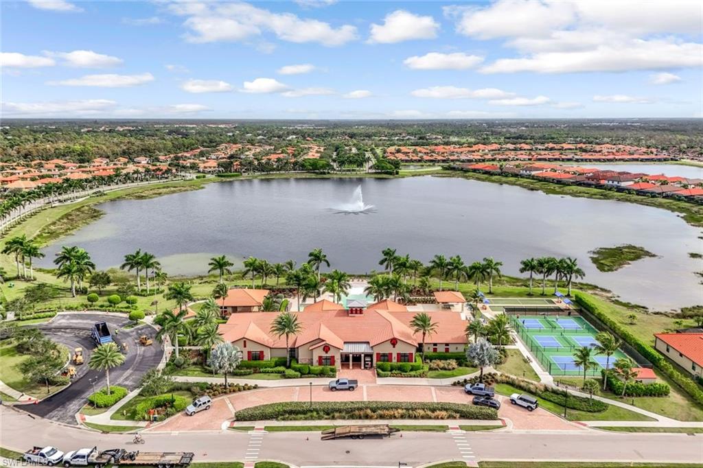 1603 Santiago Circle Naples, FL 34113 - Photo 39 of 46 an aerial view of a city and lake view