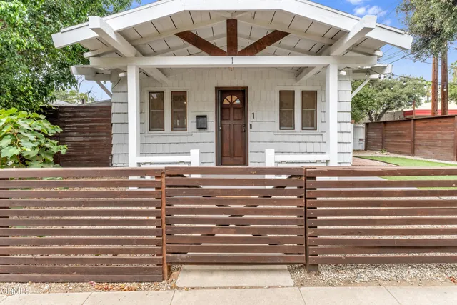 a front view of a house with windows