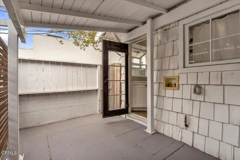 a view of a room with wooden walls
