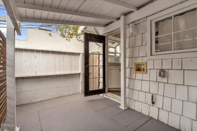 a view of a room with wooden walls