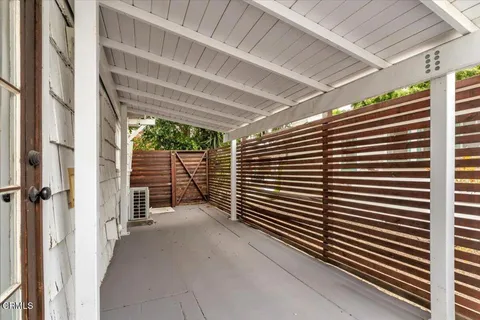 a view of a storage & utility room with washer and dryer