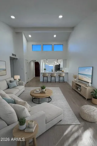 a living room with furniture and a couch