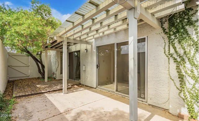 a room with gym equipment and a large window