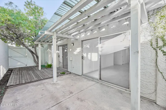a kitchen with stainless steel appliances a refrigerator and a stove top oven