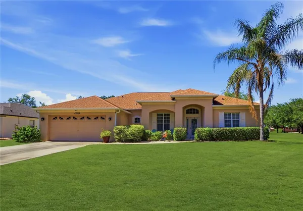 $395,000 | 12929 Regiment Drive, Grand Island, FL 32735