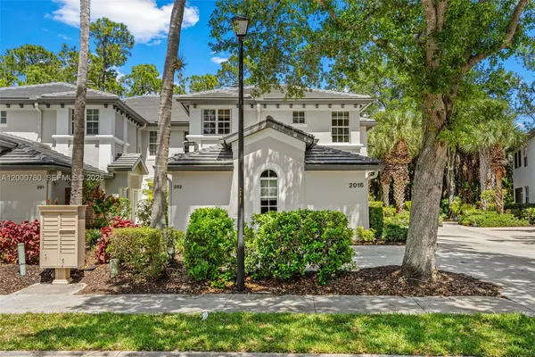 $430,000 | 2016 Tarpon Bay Drive North, Unit 202, Naples, FL 34119
