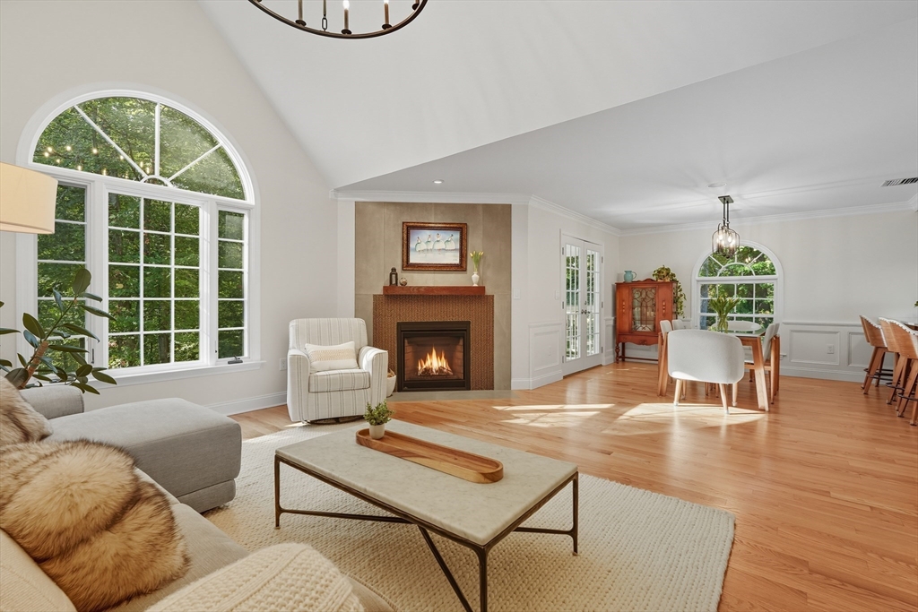 32 Windpath East, Unit 32 West Springfield, MA 01089 - Photo 11 of 40 a living room with furniture a window and a fireplace