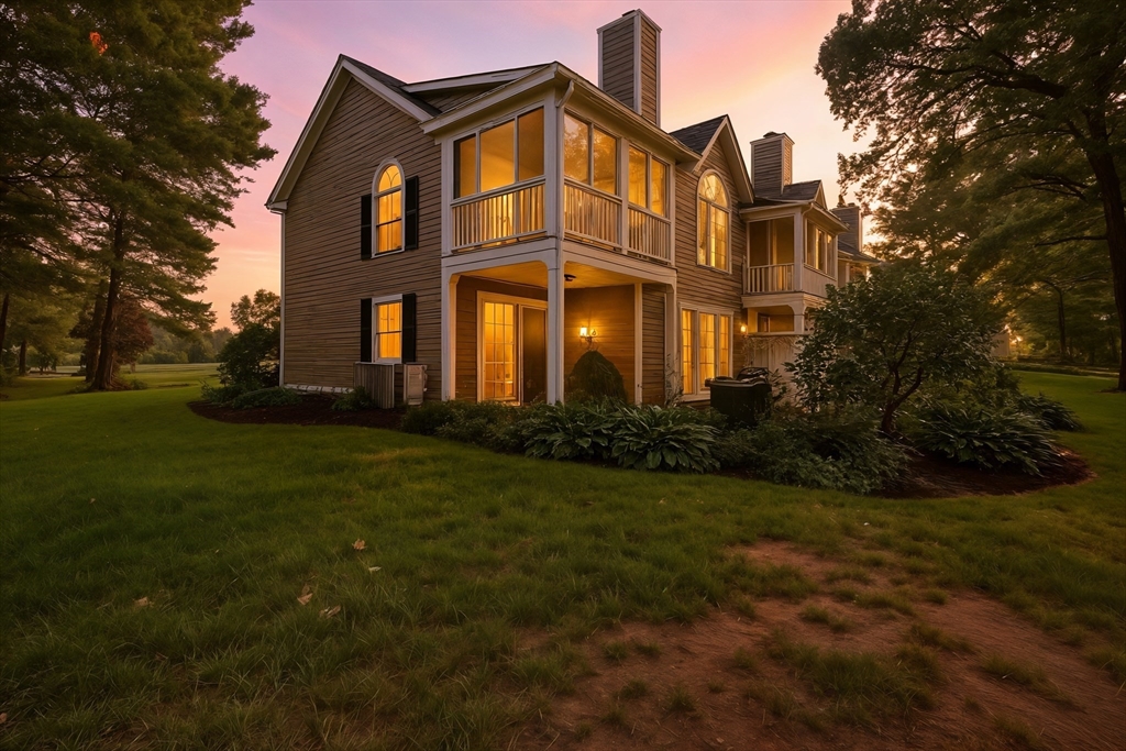 32 Windpath East, Unit 32 West Springfield, MA 01089 - Photo 2 of 40 a view of a big building with big yard and large trees
