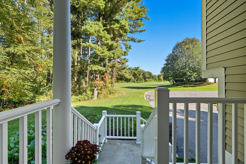 32 Windpath East, Unit 32 West Springfield, MA 01089 - Photo 5 of 40 a view of a porch with a yard