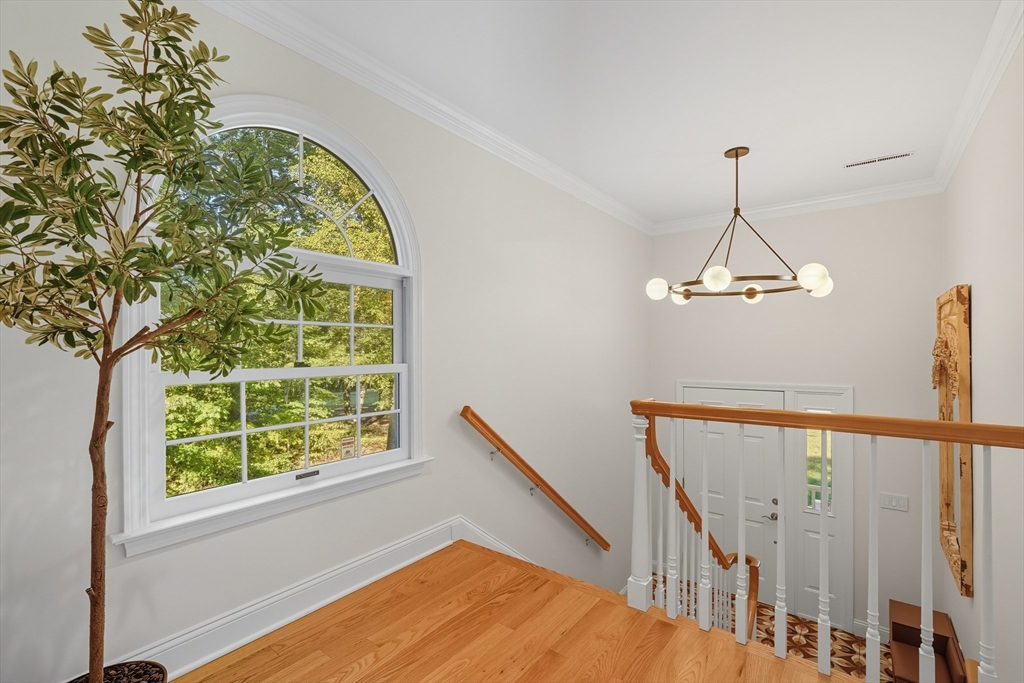 32 Windpath East, Unit 32 West Springfield, MA 01089 - Photo 8 of 40 a view of a room with wooden floor and windows
