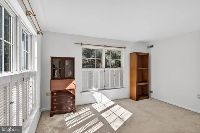 a view of livingroom with furniture and window