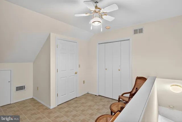 a view of a hallway with entryway