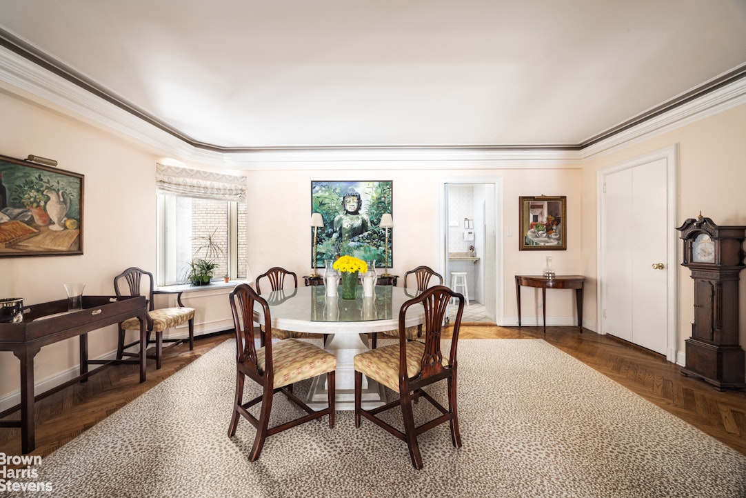 3 East 71st Street, Unit 5A Manhattan, NY 10021 - Photo 5 of 8 a view of a dining room with furniture window and wooden floor