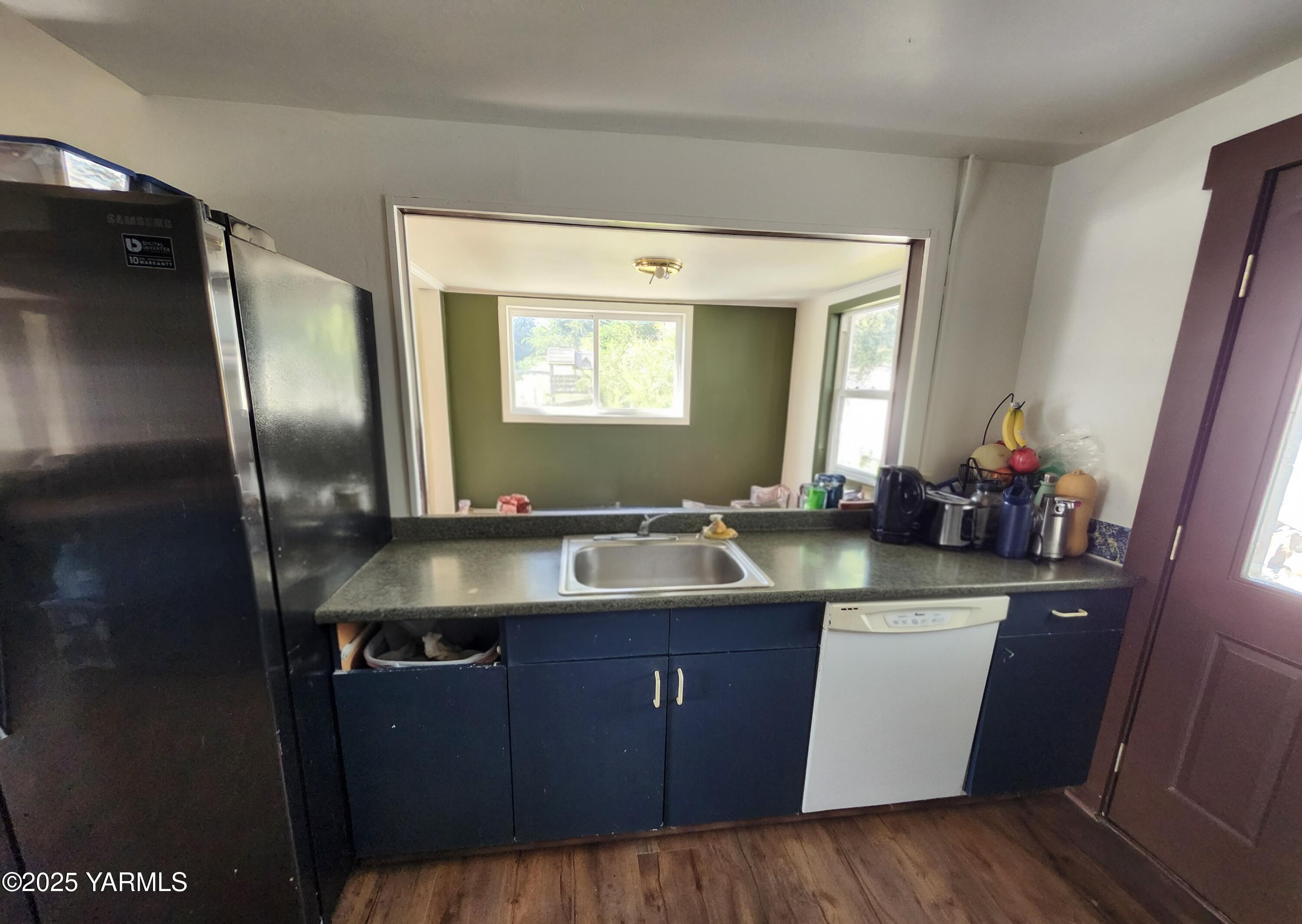 11271 Highway 12 Naches, WA 98937 - Photo 10 of 14 a bathroom with a sink a toilet and mirror