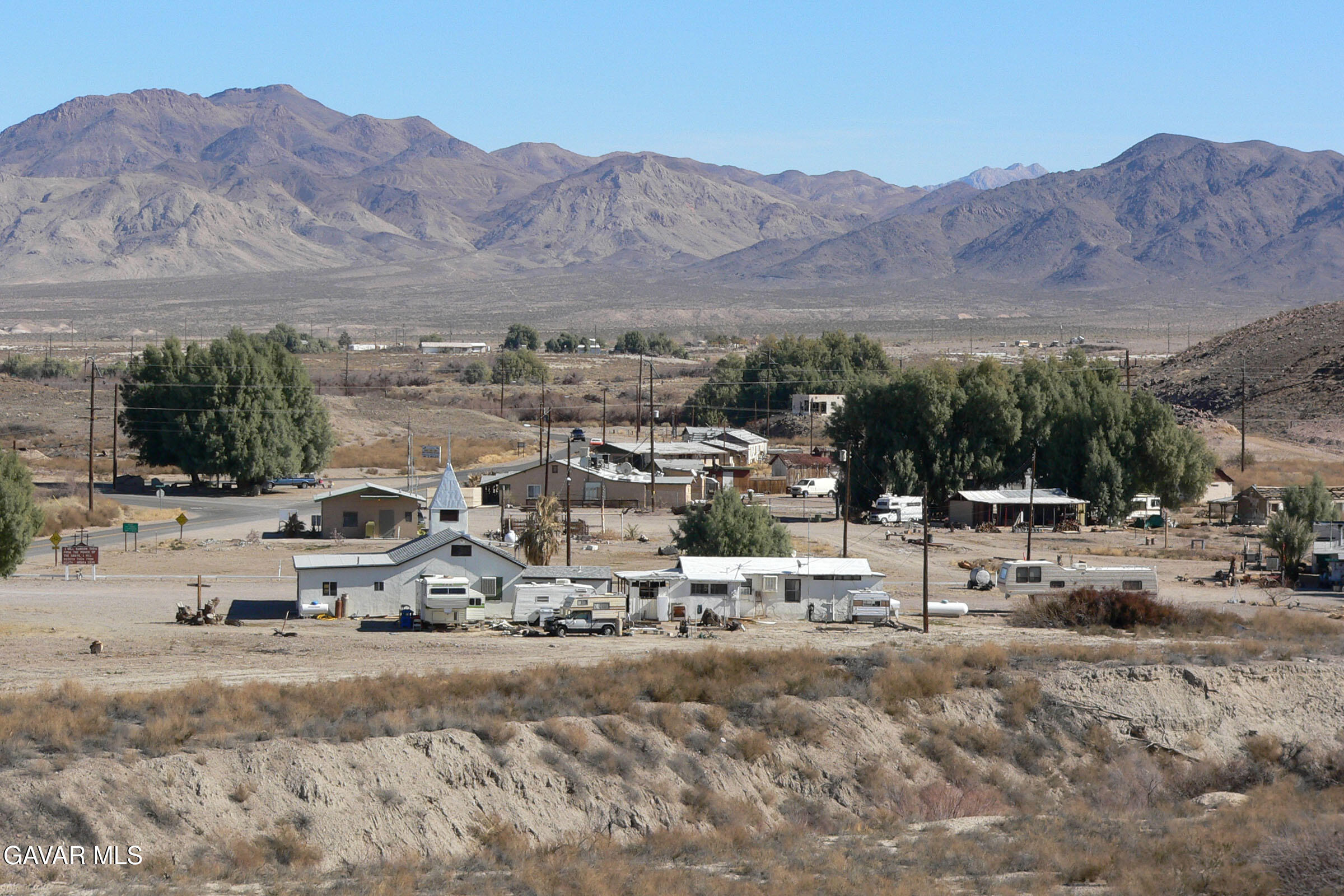Deming Way South Tecopa, CA 92389 - Photo 8 of 8 a view of a town with mountains in the background