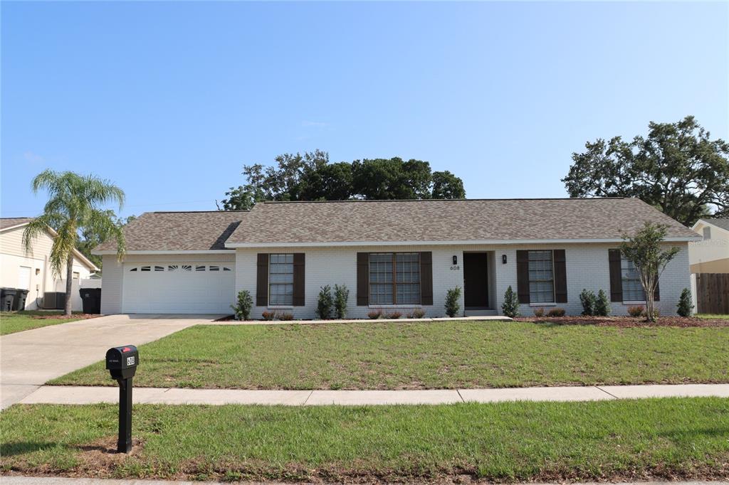 608 Rosemarie Avenue Brandon, FL 33511 - Photo 1 of 1 a front view of a house with a yard
