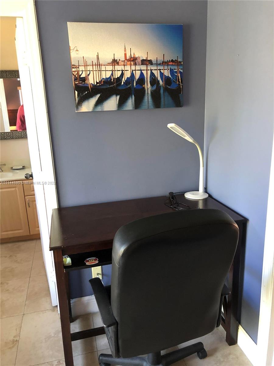 Monarch Lakes Miramar, FL 33027 - Photo 21 of 31 a view of balcony with furniture and lamp