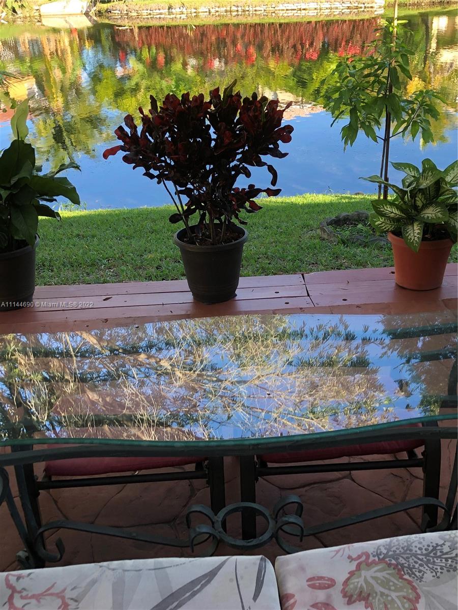 Monarch Lakes Miramar, FL 33027 - Photo 4 of 31 a view of a yard with a garden