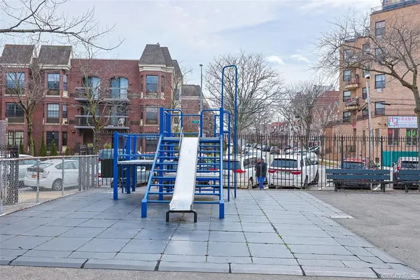 a view of a building with sitting area