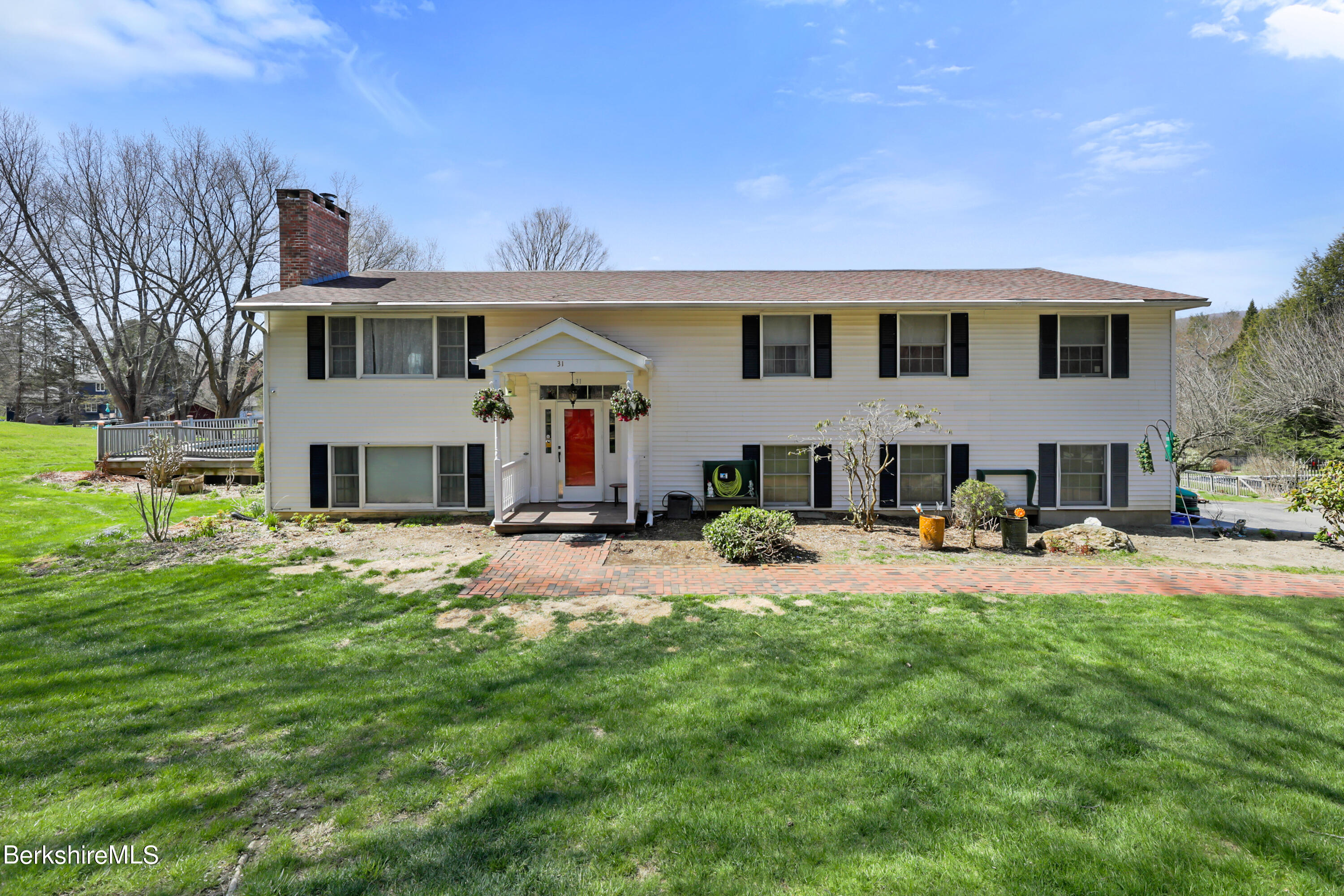 31 Olsen Road Lanesborough, MA 01237 - Photo 1 of 31 a front view of a house with swimming pool having outdoor seating