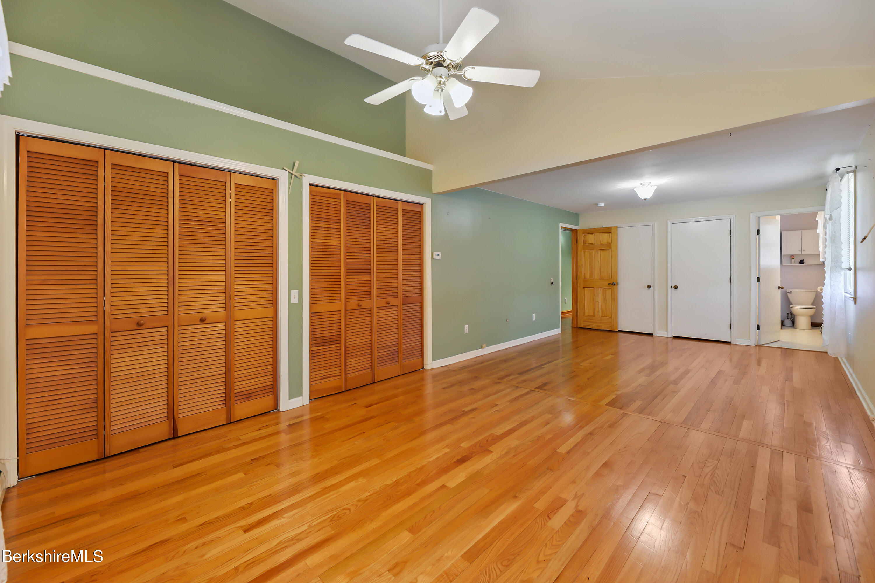 31 Olsen Road Lanesborough, MA 01237 - Photo 12 of 31 wooden floor in an empty room with a window