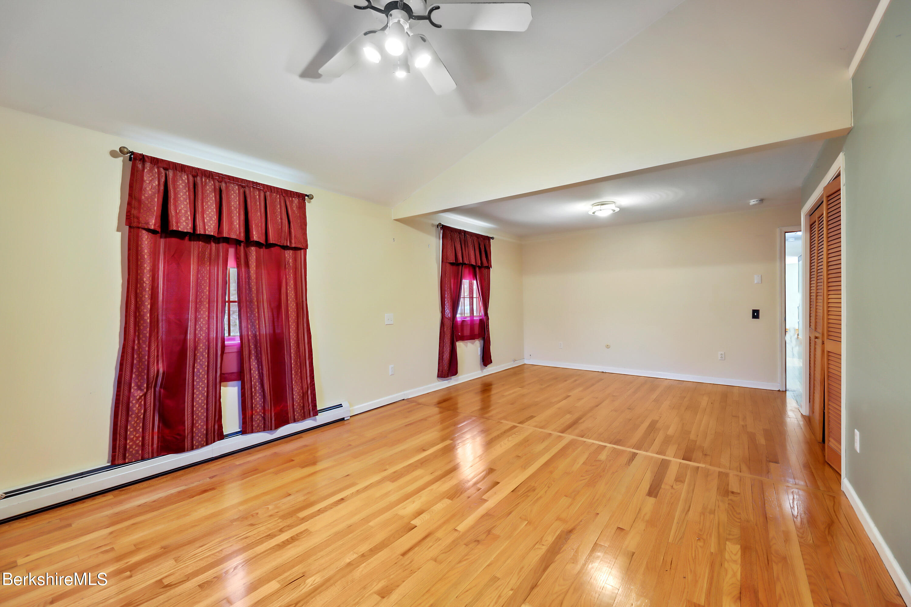 31 Olsen Road Lanesborough, MA 01237 - Photo 16 of 31 a view of a room with wooden floor and a chandelier