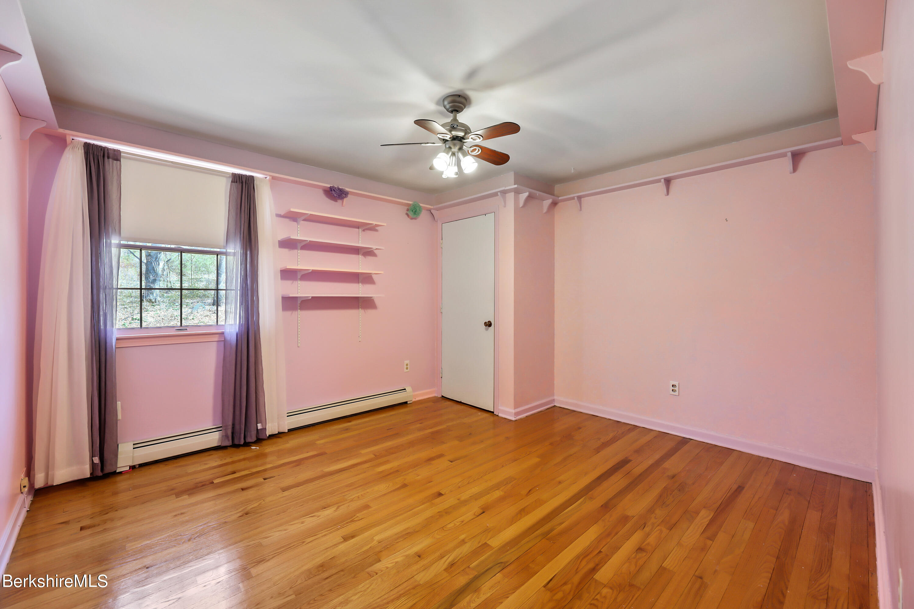 31 Olsen Road Lanesborough, MA 01237 - Photo 17 of 31 a view of empty room with wooden floor and fan