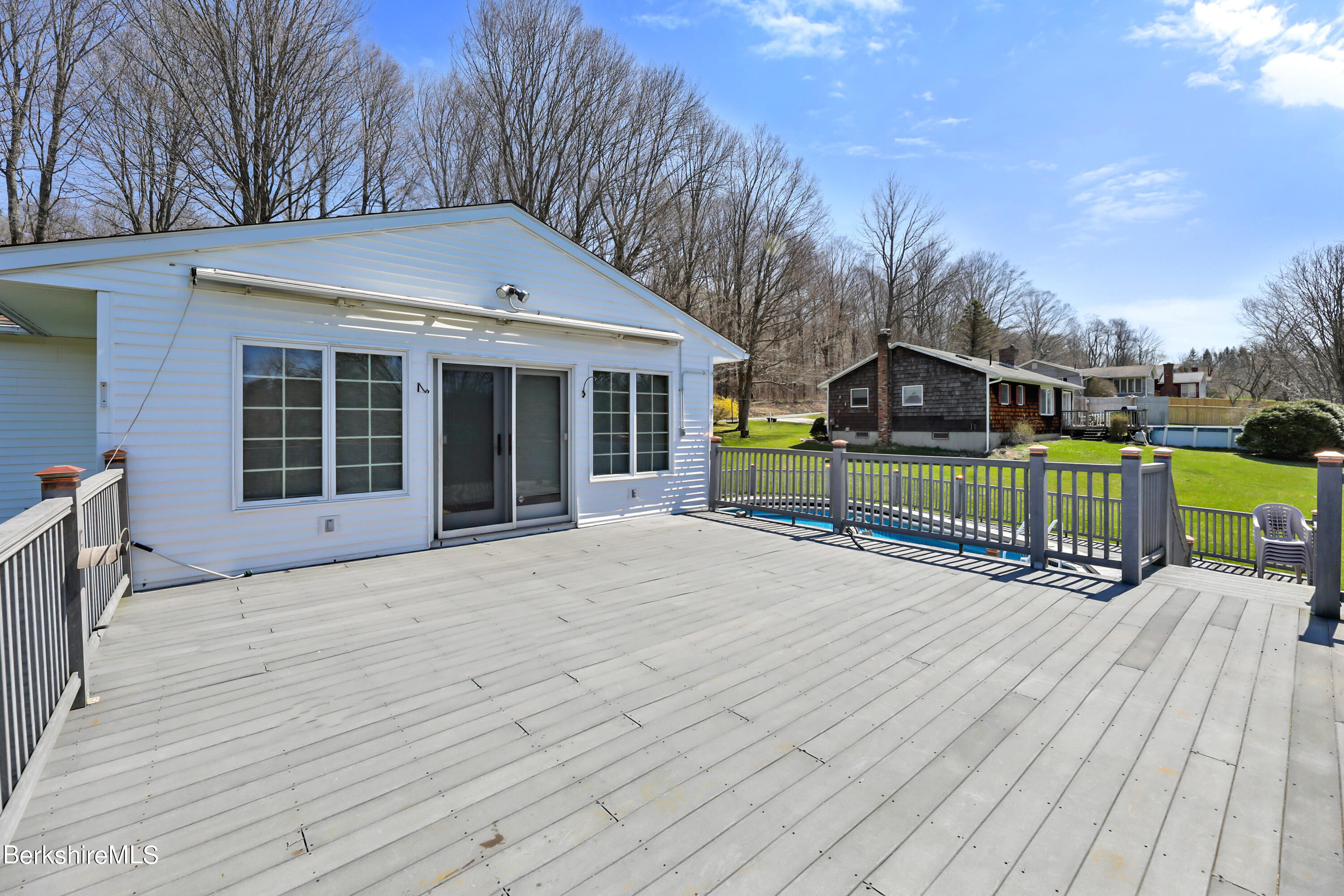 31 Olsen Road Lanesborough, MA 01237 - Photo 24 of 31 a view of a house with a yard and furniture
