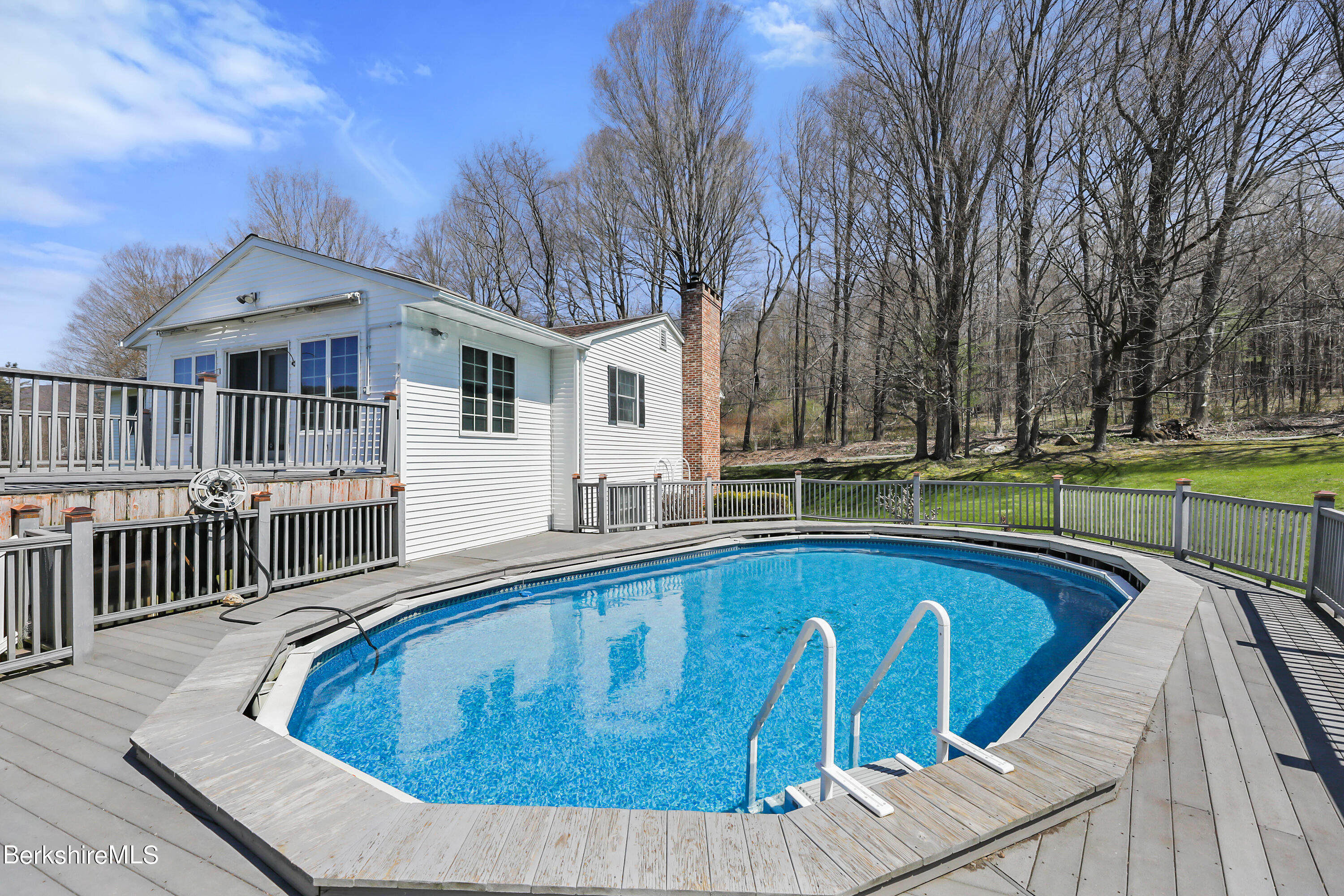 31 Olsen Road Lanesborough, MA 01237 - Photo 26 of 31 a view of a house with a wooden deck